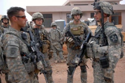 US Soldiers wearing ACUs some with the UCP-D camouflage variant.