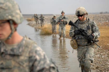 US Soldier wearing a TAP mounted to his IOTV in UCP-D.