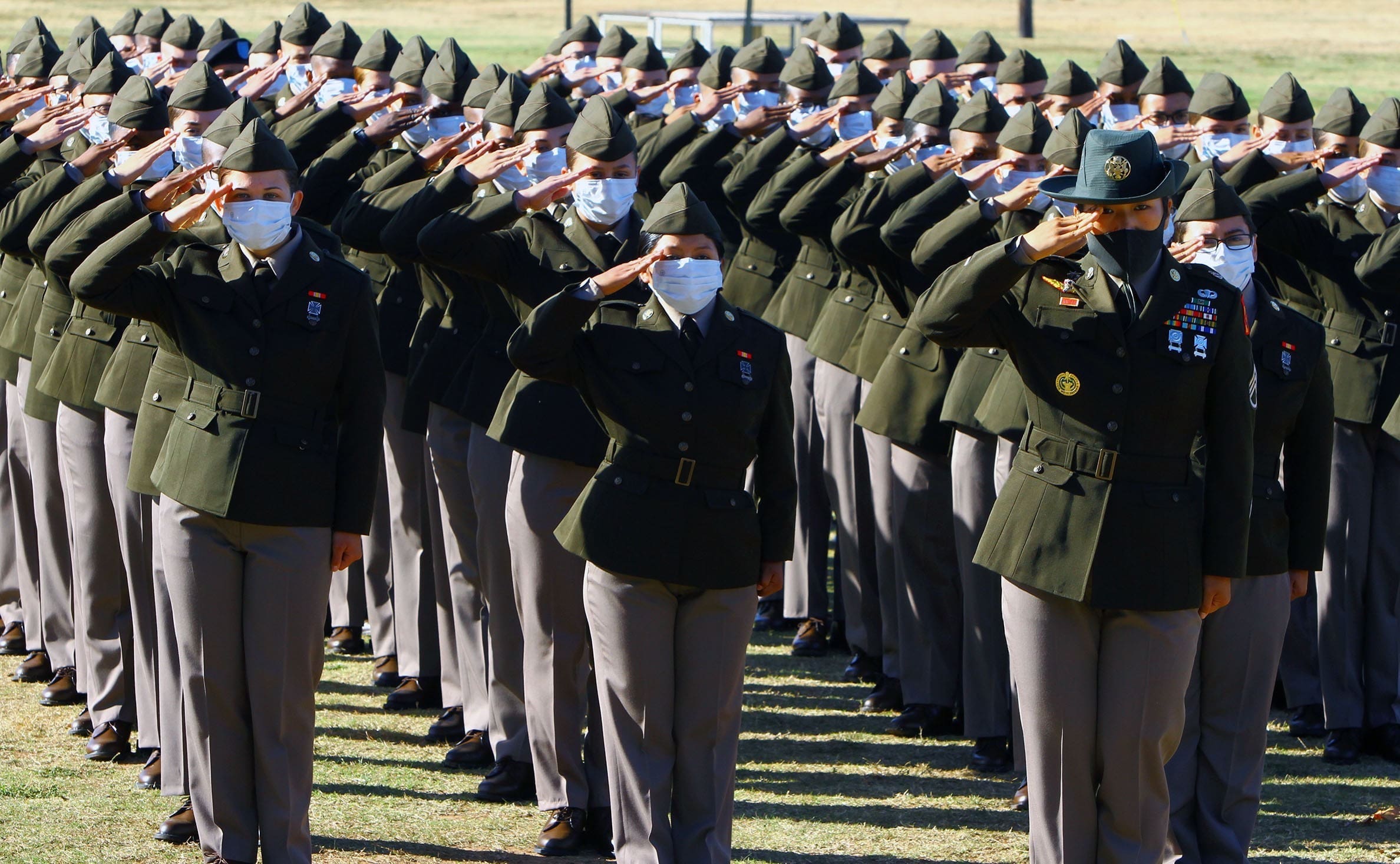 First Basic Training Class Graduates Wearing Army Green Service Uniform 