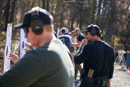 Kyle Morgan walking the line while shooters reface their targets. 