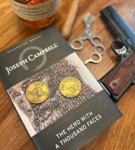 "The Hero with a Thousand Faces" goes hand in hand with a Memento Mori or Amor Fati coin.
